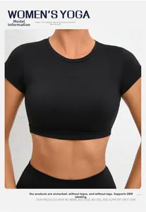 Close-up of black crop top yoga shirt showing high-stretch fabric and slim fit design