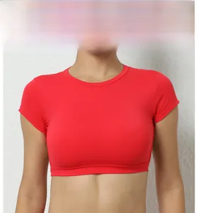 Detail view of the red short-sleeved crop top yoga shirt with a round neckline
