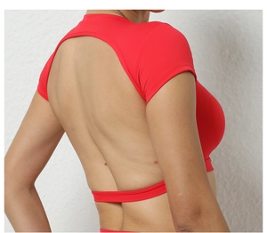 Detail shot of the backless cutout design on this red quick-dry sports yoga t-shirt