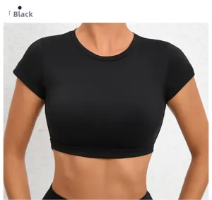 Close-up of black quick-dry yoga crop top featuring a wide hem for sports support