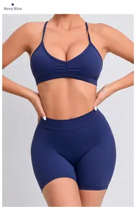 Detail view of navy quick-dry yoga set featuring V-neck sports bra and high-waist shorts