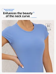 Detail view of sky blue round neck short sleeve yoga bodysuit with tight athletic fit