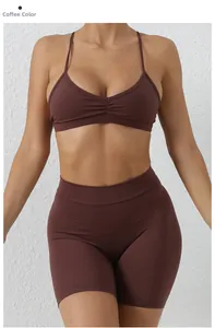 Detail view of coffee brown sports bra and high-waisted shorts with removable straps