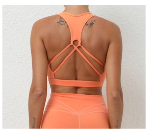 Design dos croisé de l'ensemble de yoga orange vif avec brassière et legging