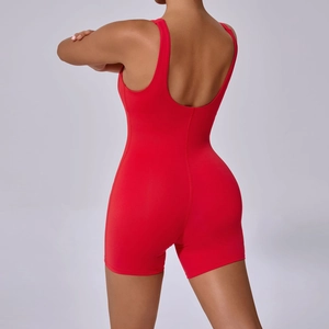Close-up of red high-elastic yoga jumpsuit featuring a deep U-shaped open back design
