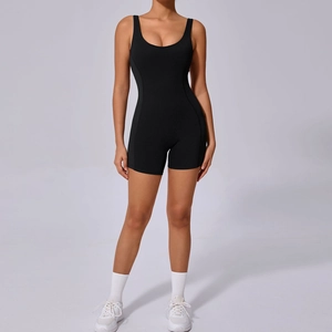 Front view of black one-piece yoga bodysuit with U-neck design and tight athletic fit