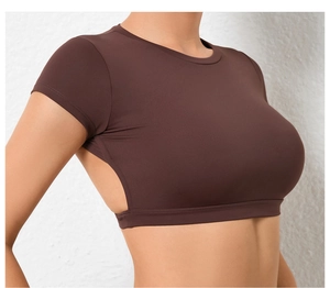 Detailed side view of brown slim fit crop top featuring a cutout open back design