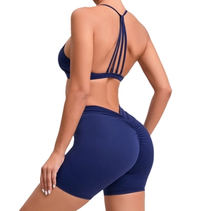 Quick-dry navy blue yoga set with multi-strap sports bra and scrunch butt gym shorts