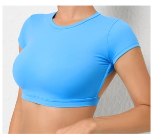Detail of blue backless yoga top showing professional stitching and cut-out design