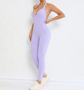 Detail of lavender high-stretch halter yoga jumpsuit featuring backless design and slim fit