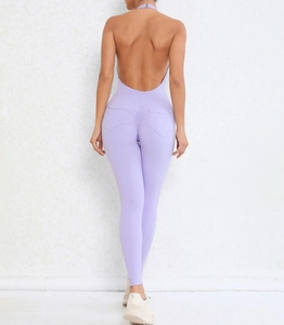 Macro view of the scrunch butt detail and backless design on lavender yoga bodysuit