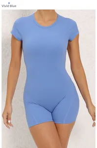 Close-up of bright blue backless yoga jumpsuit with built-in padding and short sleeves