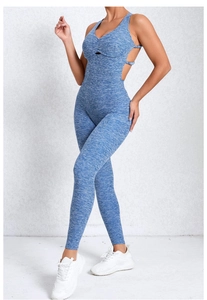 Detail of cross straps and peach lift design on heather blue yoga bodysuit