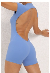 Detail view showing the deep open back design of the light blue yoga bodysuit for women