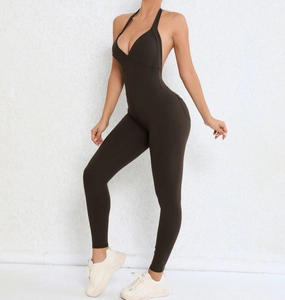 Detail of a dark brown backless halter bodysuit showing its high-stretch fabric and fit