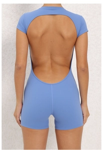 Detail view of the open-back design on this blue athletic short-sleeve yoga bodysuit