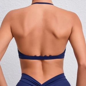 Ensemble de yoga bleu foncé avec soutien-gorge de sport licou et legging taille haute en V