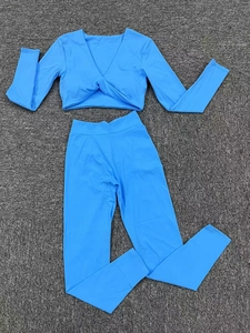 Ensemble de yoga bleu vif deux pièces avec haut à manches longues et leggings taille haute