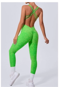 Back view of neon green yoga jumpsuit with cross-back straps and scrunch butt detail
