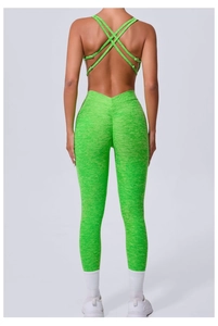Rear view of cross-back neon green yoga bodysuit featuring ruched peach butt lift design