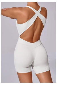 Vue détaillée du body de yoga blanc avec dos croisé ajouré et effet fessier galbé