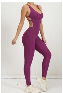 Detail of cross back cut-out and high-stretch fabric on purple yoga bodysuit