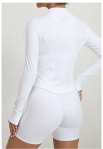 Detail of white slim-fit athletic set with stand collar and scrunch bum lifting shorts