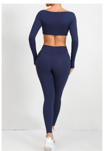 Vista posteriore del set yoga blu scuro con elevata elasticità e taglio aderente