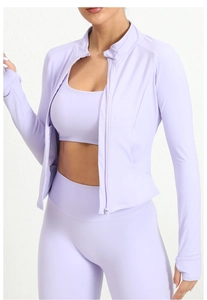 Detail view of lavender yoga set showing stand collar zipper jacket and leggings