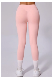 Vue arrière du legging de yoga rose à taille haute avec effet push-up et sans couture