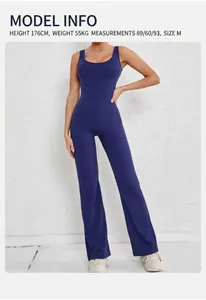 Detail of navy blue flare yoga jumpsuit showing size M fit on a 176cm model