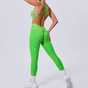 Neon green backless yoga bodysuit with crisscross straps and scrunch butt detail
