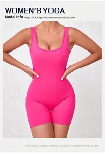 Detail of pink moisture-wicking yoga bodysuit featuring wide straps and deep U-neckline