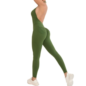 Deep green halter backless yoga bodysuit with scrunch butt lift and side pockets