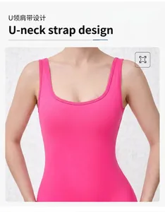 Detail of hot pink athletic bodysuit featuring U-neck and wide shoulder strap design