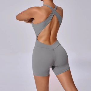 Combinaison de yoga gris foncé avec dos croisé ajouré en tissu de fitness extensible