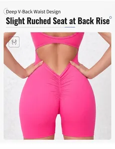 Detail view of hot pink workout bodysuit featuring deep V back and scrunch butt design