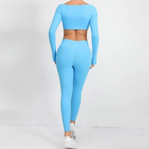 Set yoga celeste da donna con crop top a maniche lunghe e leggings a vita alta