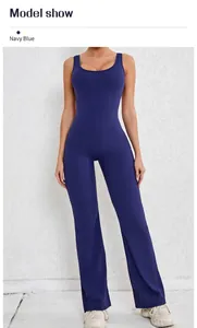 Detail view of navy blue backless sleeveless flared yoga jumpsuit with a flattering high waist