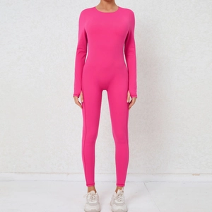 Pink backless yoga unitard with long sleeves and thumbholes for high-intensity fitness