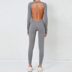Macro shot of backless yoga bodysuit design with breathable open back cutout in grey