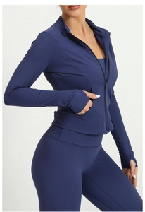 Detail of navy blue slim fit sports jacket showing thumbholes and stand collar design