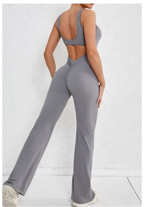 Detailed back view of dark grey backless flare jumpsuit showing the ruched butt-lifting detail