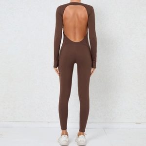 Detail of deep brown backless yoga bodysuit showing U-shaped open back and tight fit