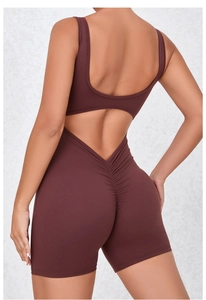 Detail view of backless one-piece yoga romper with ruched booty design and V-cut waist