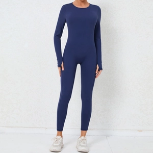 Detail of dark blue yoga jumpsuit featuring long sleeves and functional thumb holes