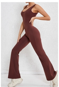 Detail view of coffee brown backless yoga bodysuit with flared legs and slimming fit