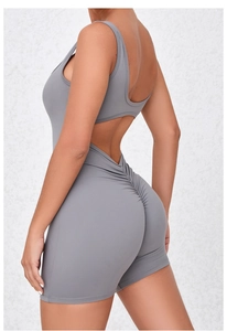 Close-up of grey backless yoga jumpsuit featuring scrunch butt lifting detail
