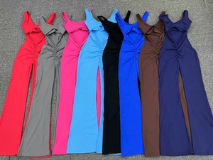Flat lay of ribbed cut-out jumpsuits with flared legs in eight vibrant colors