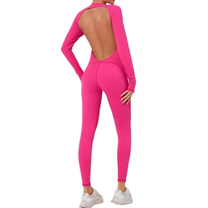 Women's backless long sleeve yoga jumpsuit in rose pink high-stretch athletic fabric